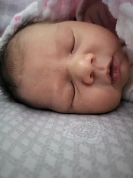  Newborn Sleeping 2 Stock Photos