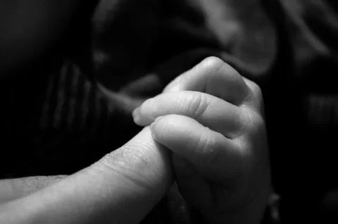 Newborn touch Stock Photos