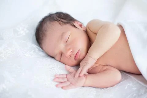 Newborn on white background Stock Photos