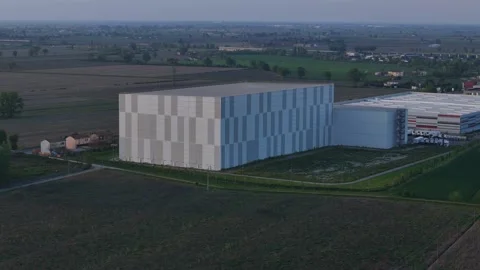 NewCold automated cold storage warehouse in Fiorenzuola d'Arda drone Stock Footage 340604374