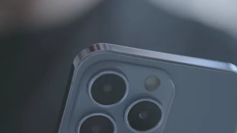 Newest Apple Iphone 13 Pro smart phone filmed in close up Stock Footage 163827887