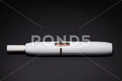 Newest electronic cigarettes, heating tobacco system IQOS Stock Photos