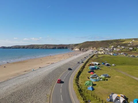 Newgale Beach In Pembrokeshire Is A Huge Sandy Beach Backed With A Pebble Emb Stock Photos