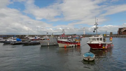 Newhaven harbour Edinburgh, Scotland fishing boats and other craft UK Stock Footage