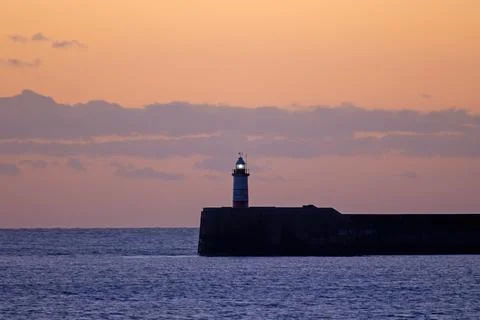 Newhaven Lighthouse at Sunset Stock Photos