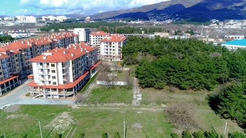 A newly built apartment complex consisting of several multi-storey buildings Stock Footage 129974895