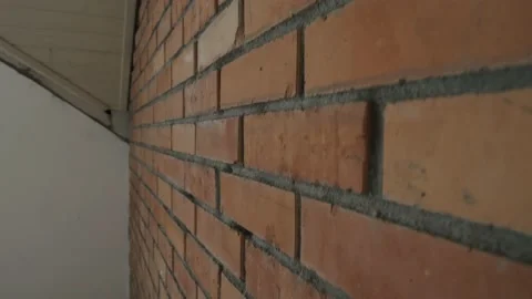 Newly built brown brick wall Stock Footage 132171427