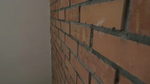Newly built brown brick wall Video stock 133708164