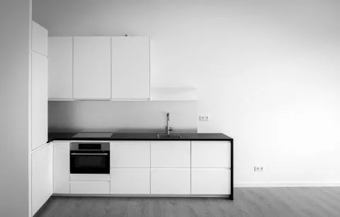 Newly built kitchen in empty living room Stock Photos