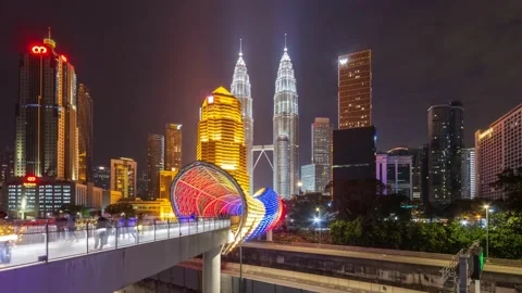 A newly built pedestrian bridge named Saloma link near Kuala Lumpur Petronas Twi Stock Footage 150343870