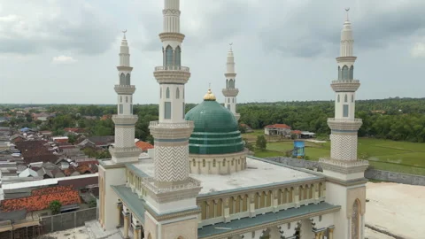 Newly Constructed Green Dome Mosque Madura Island Indonesia Drone Rise Up 4K Stock Footage 337979357