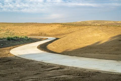 Newly constructed section of a paved bike trail, Poudre trail in northern C.. Stock Photos