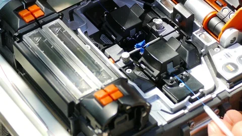 Newly welded fiber optic cable with a sleeve on 스톡 동영상 123586858