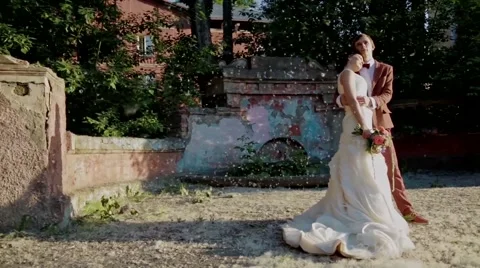 Newlyweds and floating fluff Stock Footage 61774309