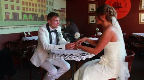 Newlyweds in Caffe Stock Footage 33653926