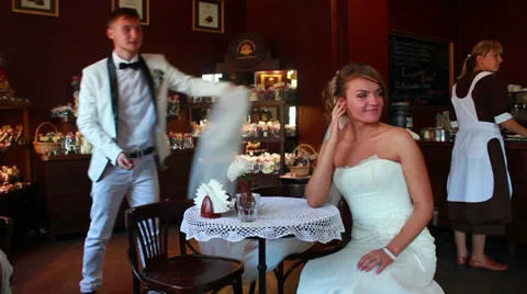 Newlyweds in Caffe Stock Footage 33653935
