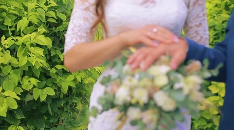 Newlyweds gently touch hands.mp4 Stock Footage 56049639