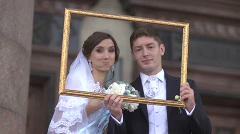 Newlyweds in a picture frame Stock Footage 62106629