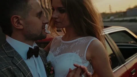 Newlyweds in the sunrays slowmotion Stock Footage 61774349