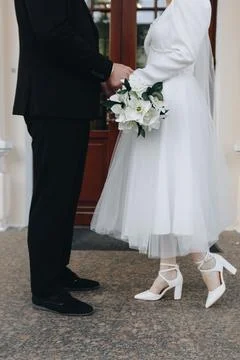 Newlyweds Walking Hand in Hand Stock Photos