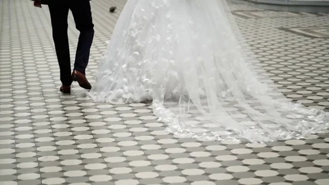 Newlyweds walking slowmotion Stock Footage 79648542