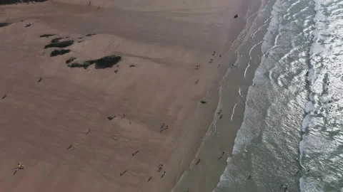 Newquay beach rocks drone 4K Cornwall Stock Footage 163457941