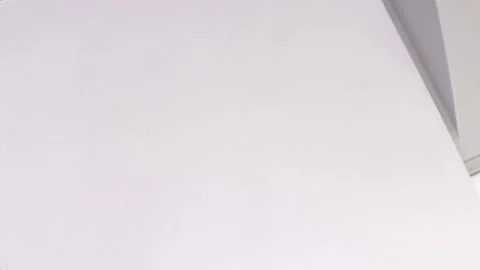 News, office printer prints on a white sheet of paper, close-up, top view, fr Stock Footage 183449854