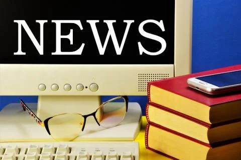 News. Reading text messages on the computer screen about significant events. Stock Photos
