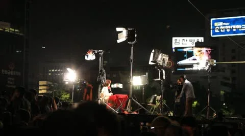 Newscast at concert at night Stock Footage