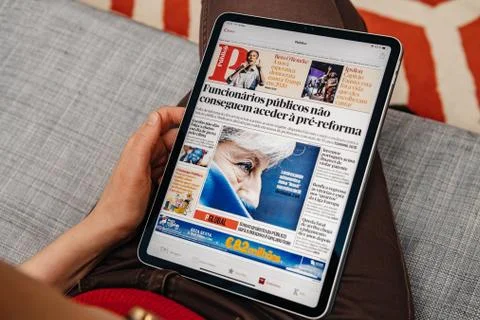 Newspaper about daily news in Portugal and Brexit on Apple news Stock Photos