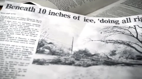 Newspaper Article about Winter Ice Storm Stock-Footage 137429056