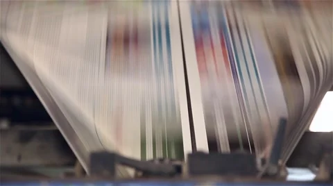 Newspaper being printed and going through printing press Stock Footage 57323251