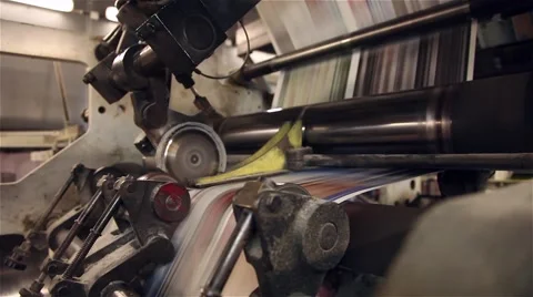 Newspaper being printed on a printing press Stock Footage 57323217