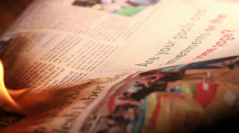 Newspaper Burst into Flames Stock Footage 25688904