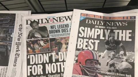 Newspaper Coverage of the Death of Jim Brown Nfl Great, Activist, Film Star Stock Footage 241701876