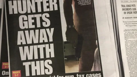 Newspaper Coverage of the Hunter Biden will plead guilty in gun case Stock Footage 244594064