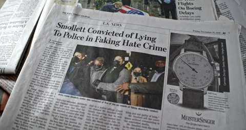 Newspaper Coverage of  Jussie Smollett, actor guilty of Faking Hate Crime Video stock 168166422