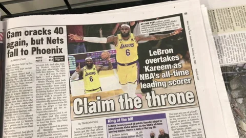 Newspaper Coverage of Lebron James Becomes NBA Leading Scorer Stock Footage 232735257