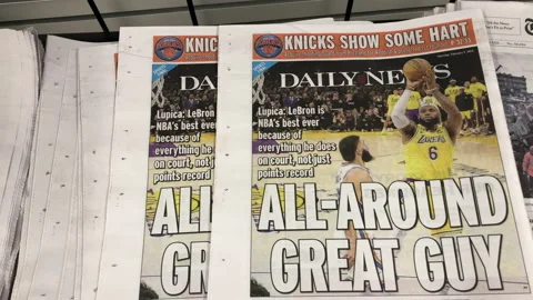 Newspaper Coverage of Lebron James Breaks Scoring Record Stock Footage 232734691