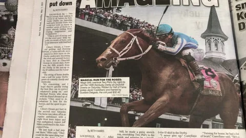 Newspaper Coverage of Mage Wins The Kentucky Derby at Churchill Downs Stock Footage 240784123