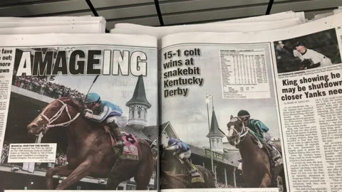 Newspaper Coverage of Mage Wins The Kentucky Derby at Churchill Downs Stock Footage 240784480