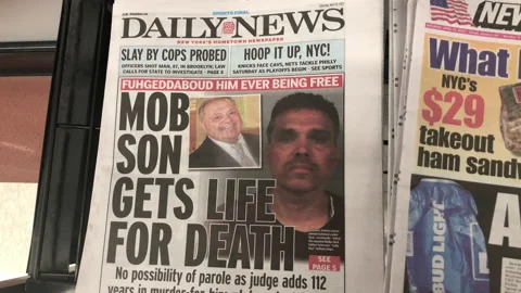 Newspaper Coverage of Mobster's Son Gets Life Sentence for Father's Murder. Stock Footage 238778604