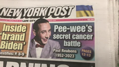 Newspaper Coverage of Paul Reubens, actor best known as Pee-wee Herman, dies Video stock 247371753