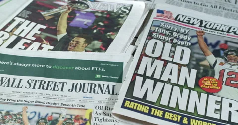 Newspaper Coverage of Tom Brady Winning his seventh Super Bowl with Tampa Stock Footage 148499771