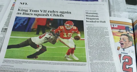 Newspaper Coverage of Tom Brady Winning his seventh Super Bowl with Tampa Stock Footage 148499927