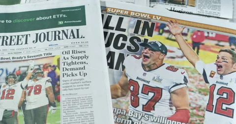 Newspaper Coverage of Tom Brady Winning his seventh Super Bowl with Tampa Stock Footage 148500301