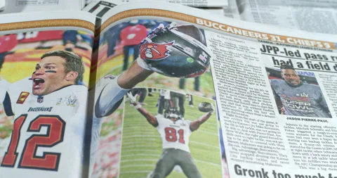 Newspaper Coverage of Tom Brady Winning his seventh Super Bowl with Tampa Stock Footage 148500480