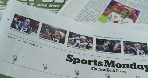 Newspaper Coverage of Tom Brady Winning his seventh Super Bowl with Tampa Stock Footage 148501066