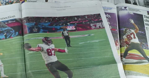 Newspaper Coverage of Tom Brady Winning his seventh Super Bowl with Tampa Stock Footage 148501291