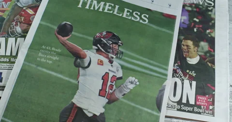 Newspaper Coverage of Tom Brady Winning his seventh Super Bowl with Tampa Stock Footage 148501502